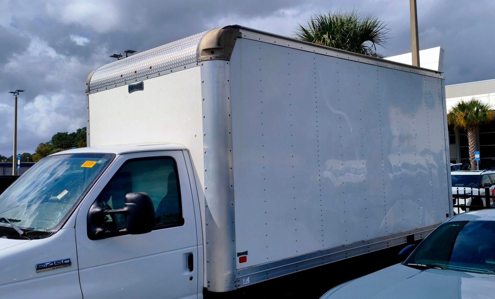 Commercial vehicle debranding and box truck wrap removal